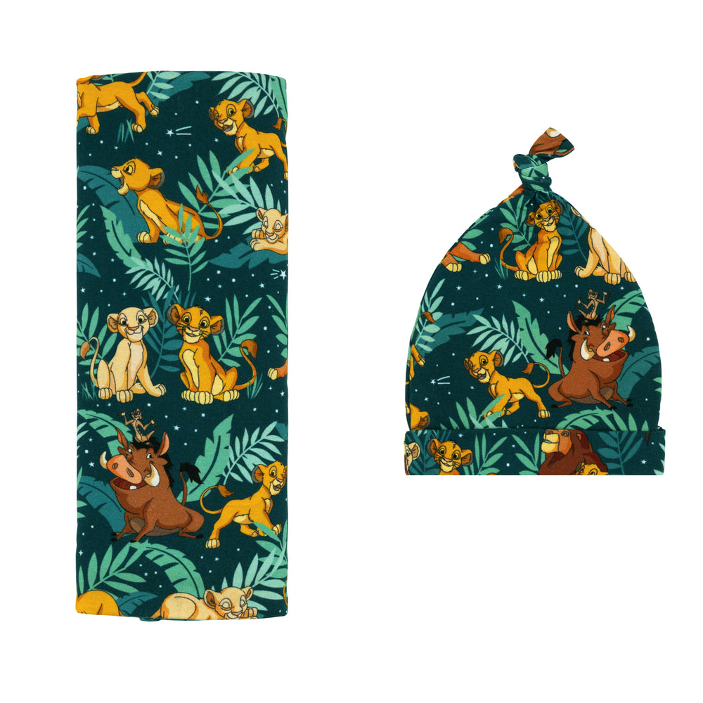 Flat lay image of a Disney Simba's Sky swaddle and hat set