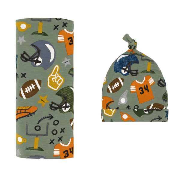 Flat lay image of the Touchdown Time Swaddle & Hat Set