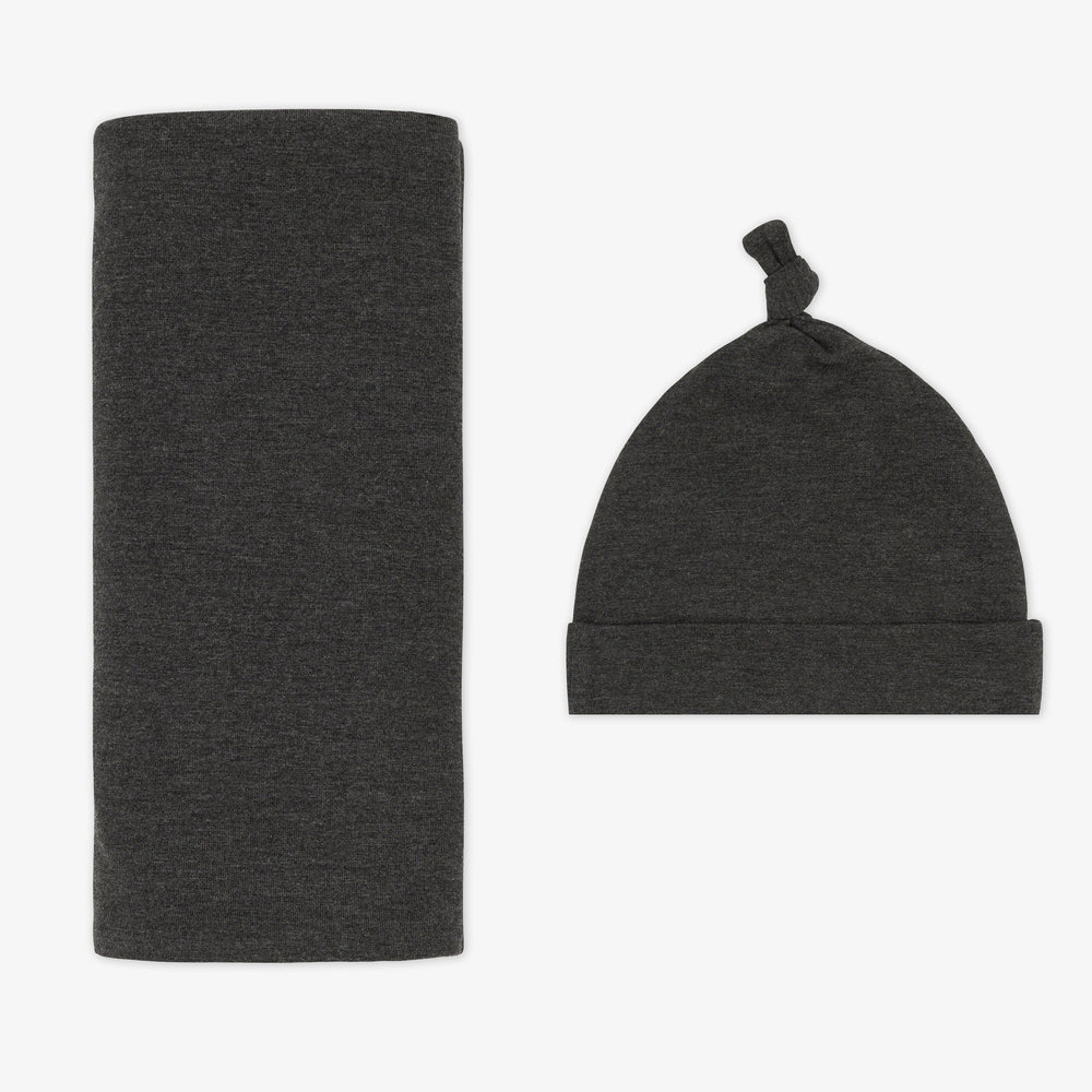 Flat lay image of a Cozy heather black swaddle and hat set