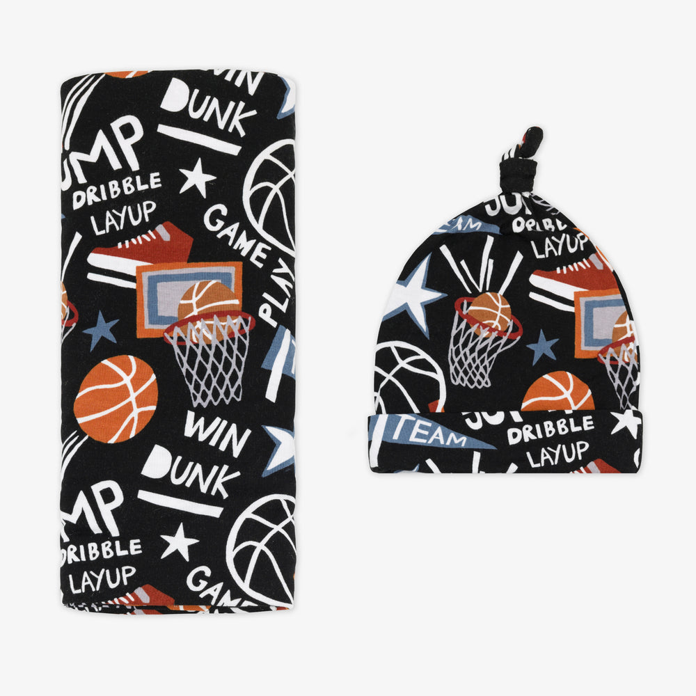 Flay lay of the Black Slam Dunk bamboo swaddle and hat set