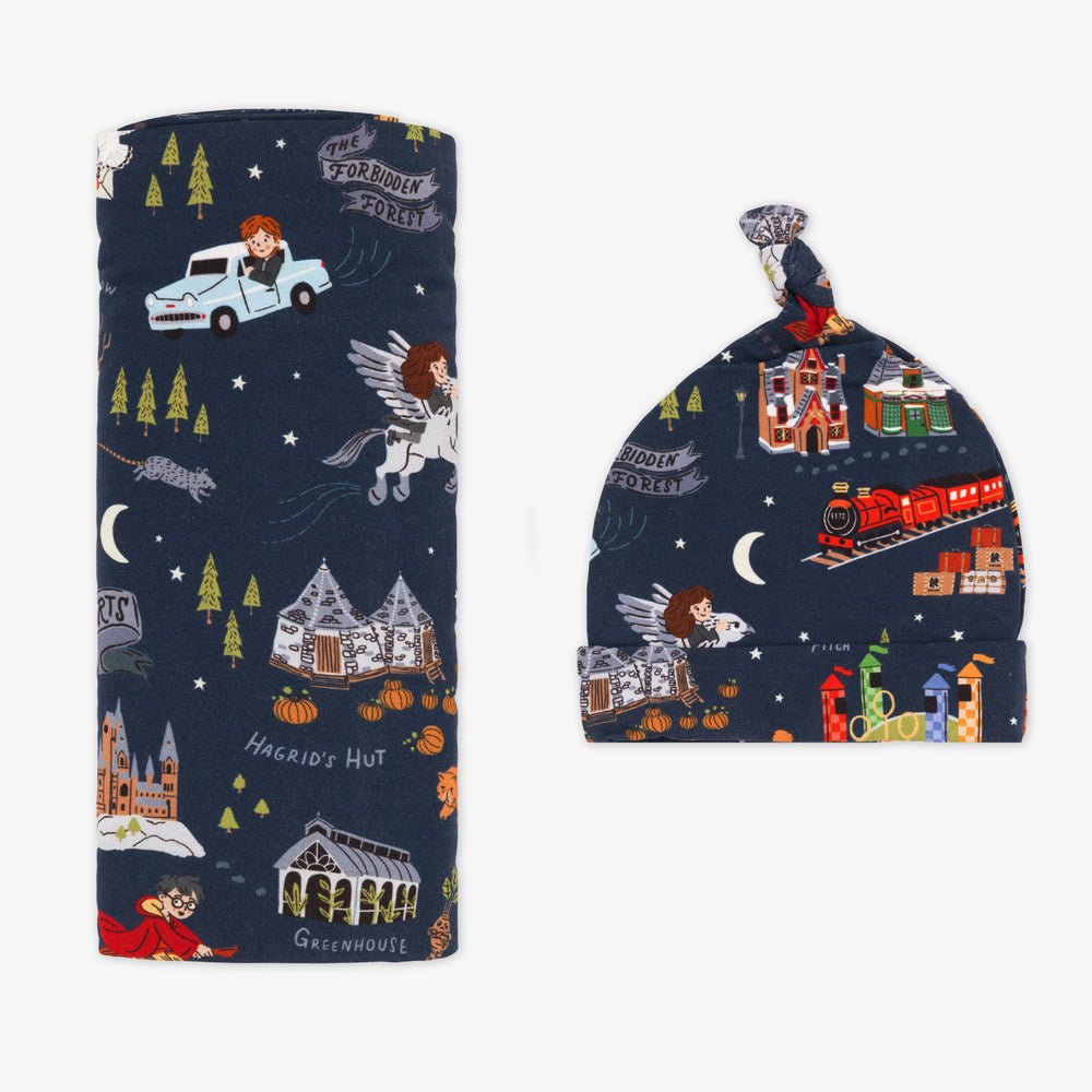 Flat lay image of an Evening at Hogwarts swaddle and hat set