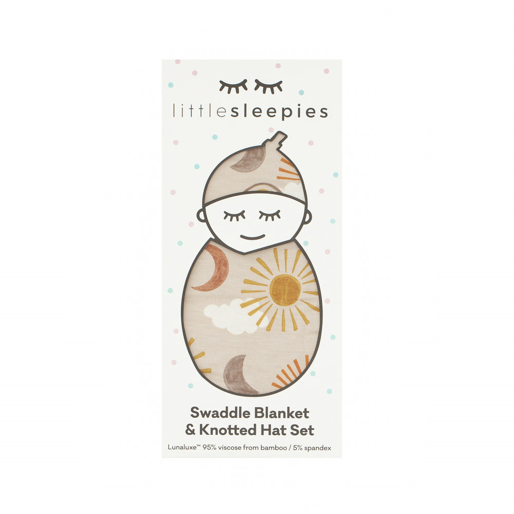 image of a Desert Sunrise swaddle and hat set in little sleepies peek a boo packaging 