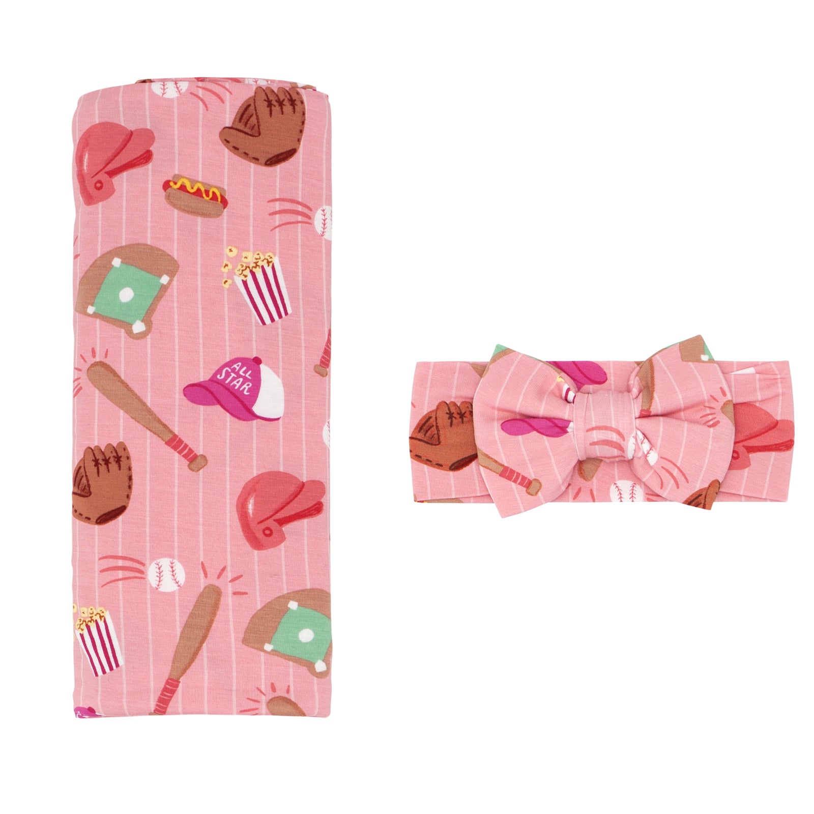 Flat lay image of a Pink All Stars swaddle and luxe bow headband set