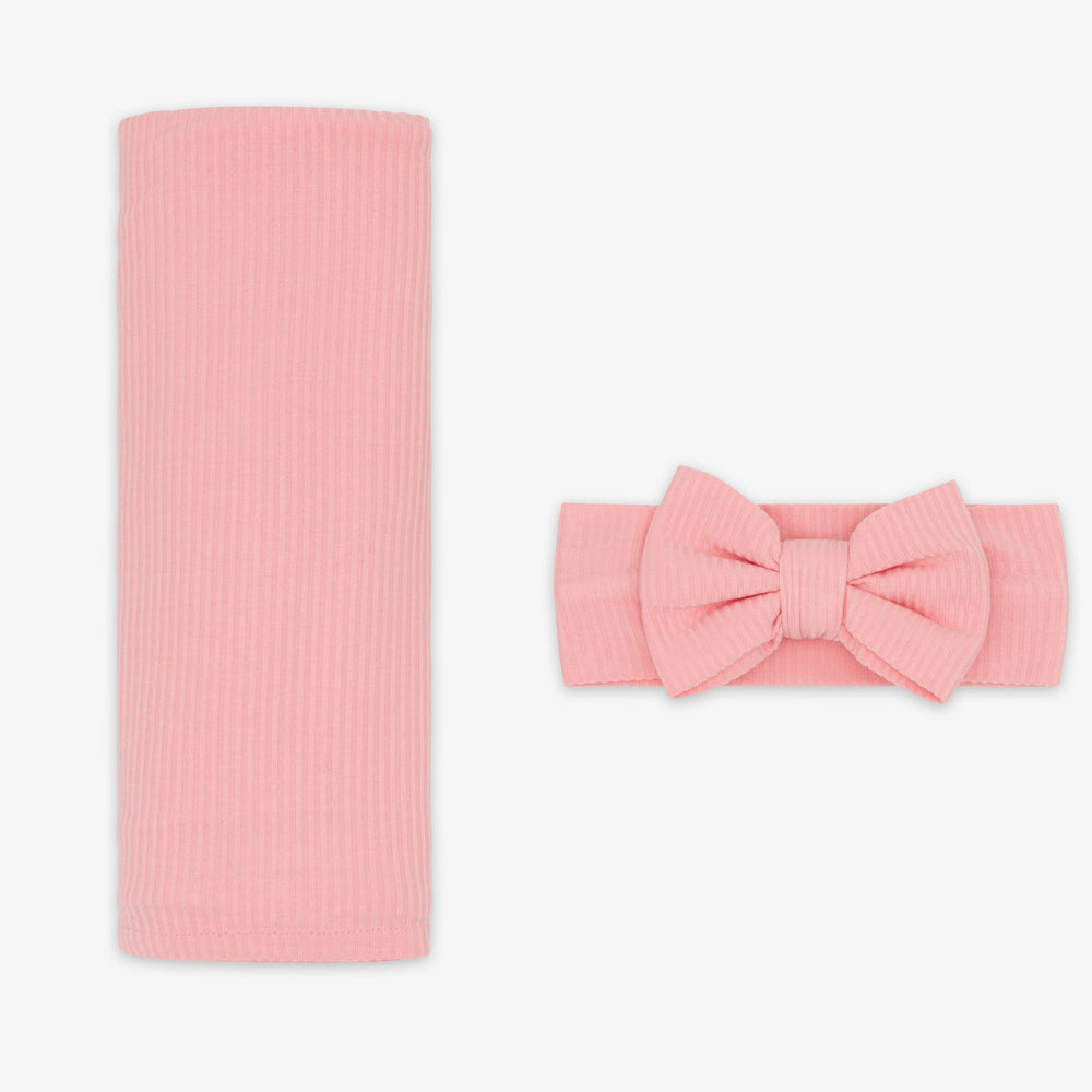 Flat lay images of the Bubblegum Ribbed Swaddle & Luxe Bow Headband Set