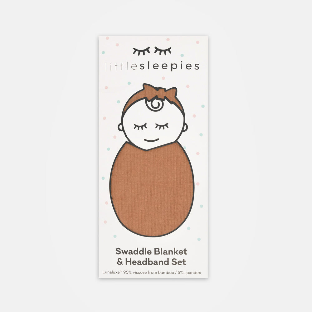 Image of the packaging for a Caramel Ribbed Swaddle & Luxe Bow Headband Set