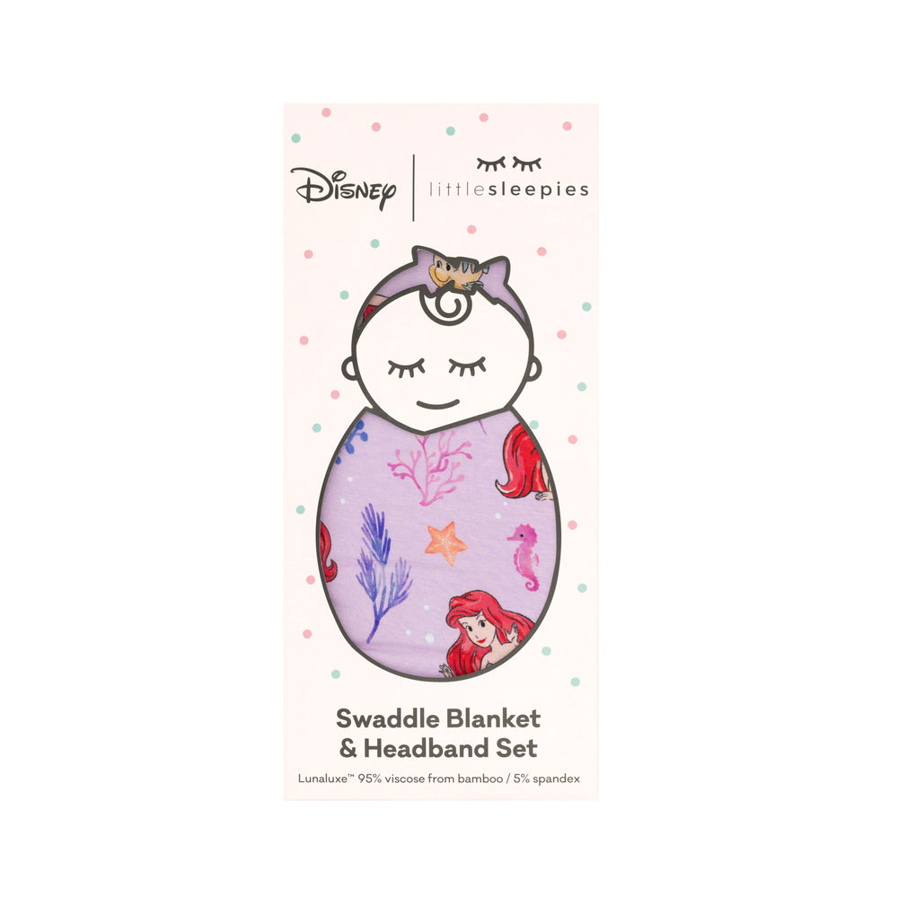  image of a Disney Part of Her World swaddle and luxe bow headband set in Little Sleepies peek a boo packaging 