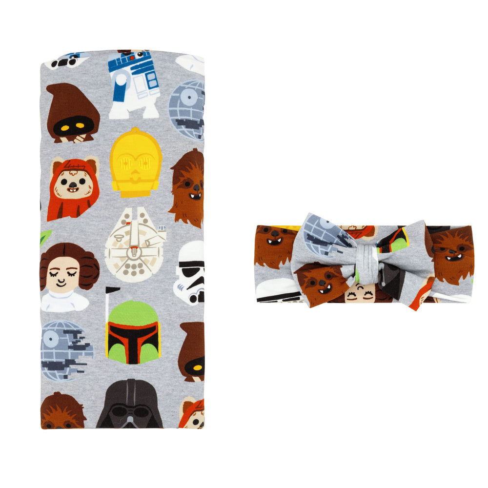 Flat lay image of a Legends of the Galaxy swaddle & luxe bow headband set