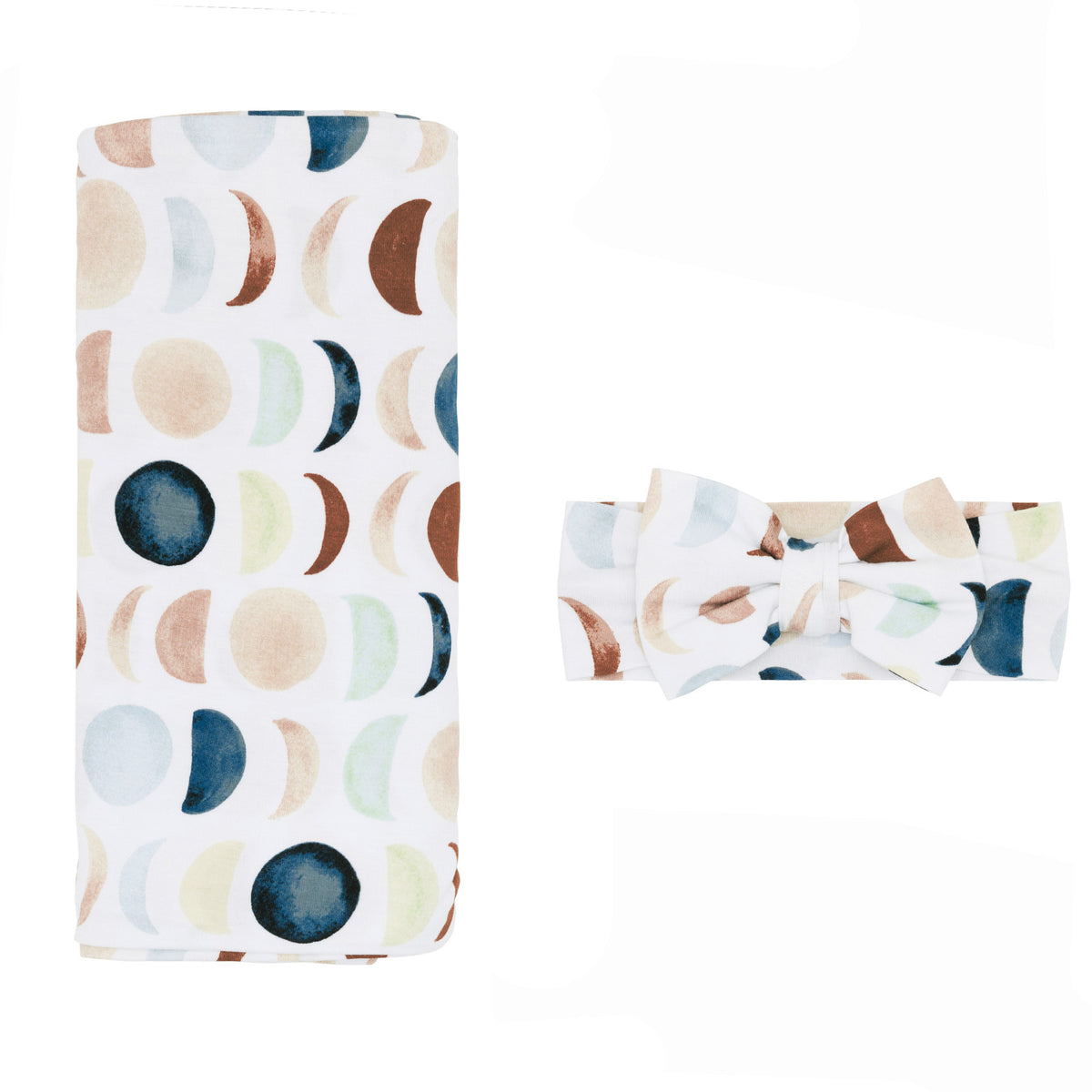 Flat lay of the Luna Neutral Swaddle & Luxe Bow Headband Set