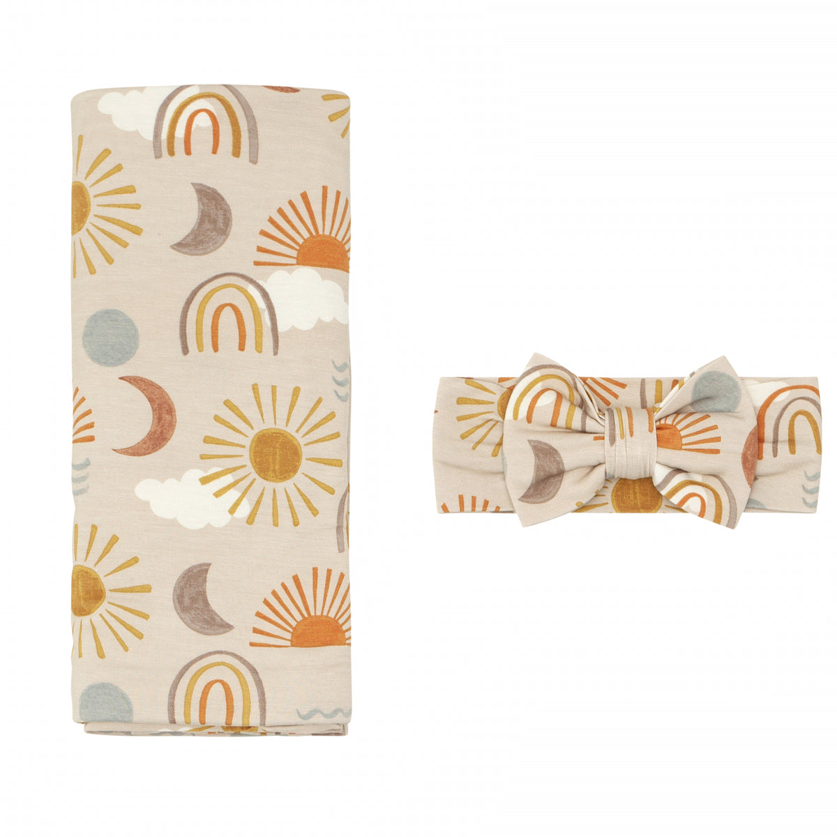 flat lay image of a Desert Sunrise swaddle & luxe bow headband set