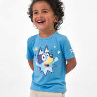 Child wearing a Bluey graphic tee and coordinating shorts