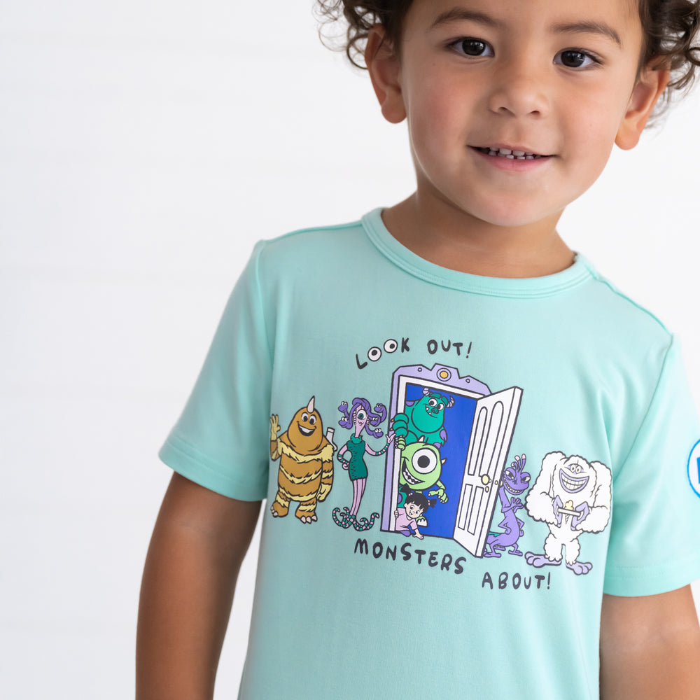 Additional image of child wearing the Disney Monsters, Inc. Graphic Tee