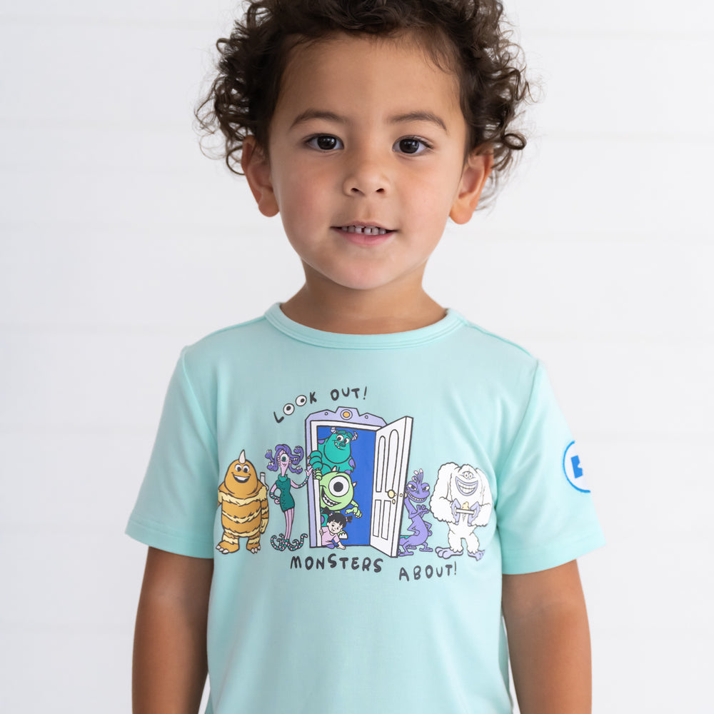 Image of child wearing the Disney Monsters, Inc. Graphic Tee