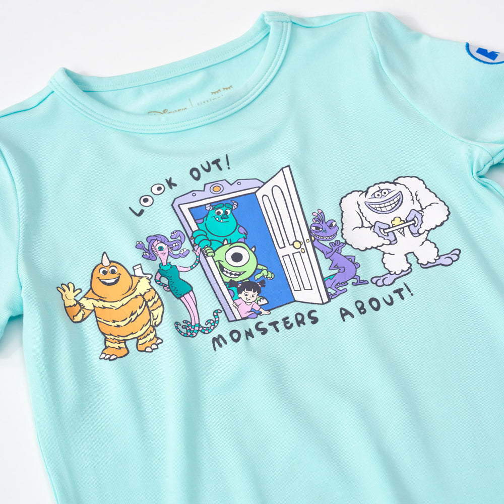 Close up flat lay image of the graphic on the Disney Monsters, Inc. Graphic Tee