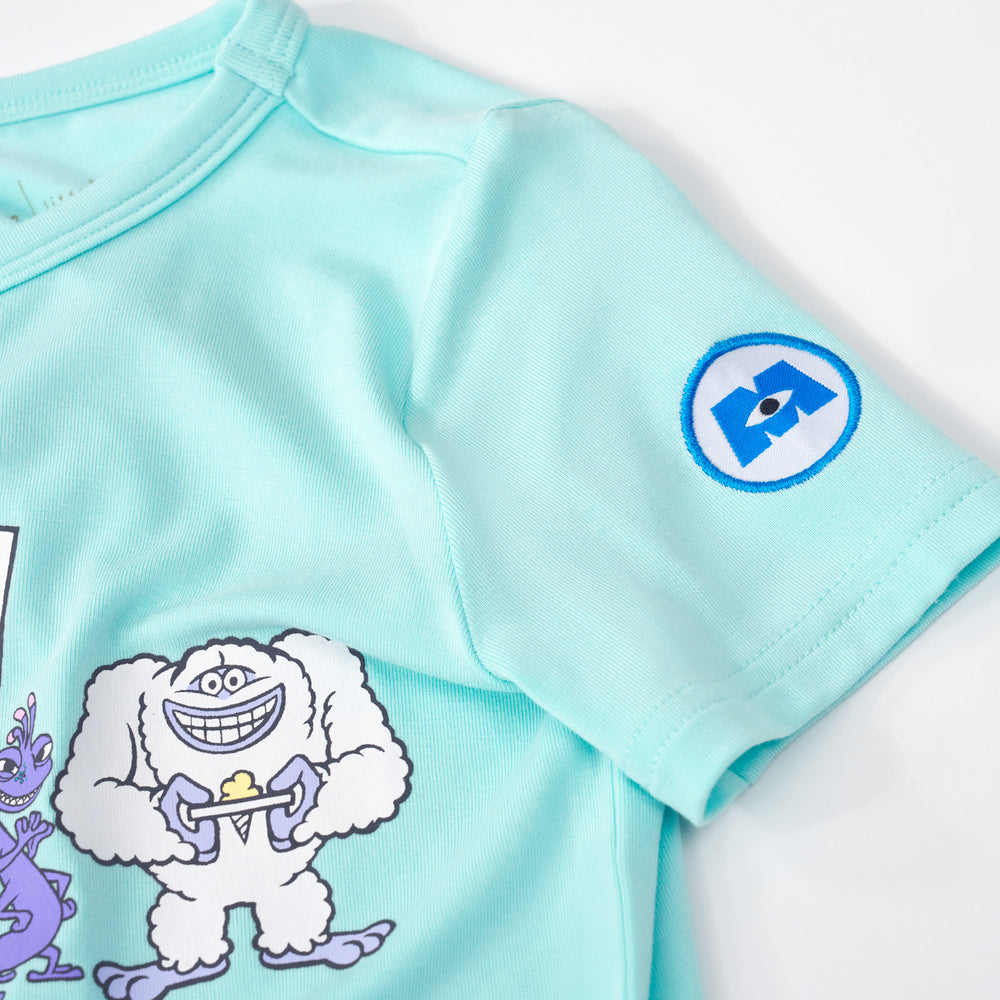 Close up flat lay image of the the sleeve detail on the Disney Monsters, Inc. Graphic Tee