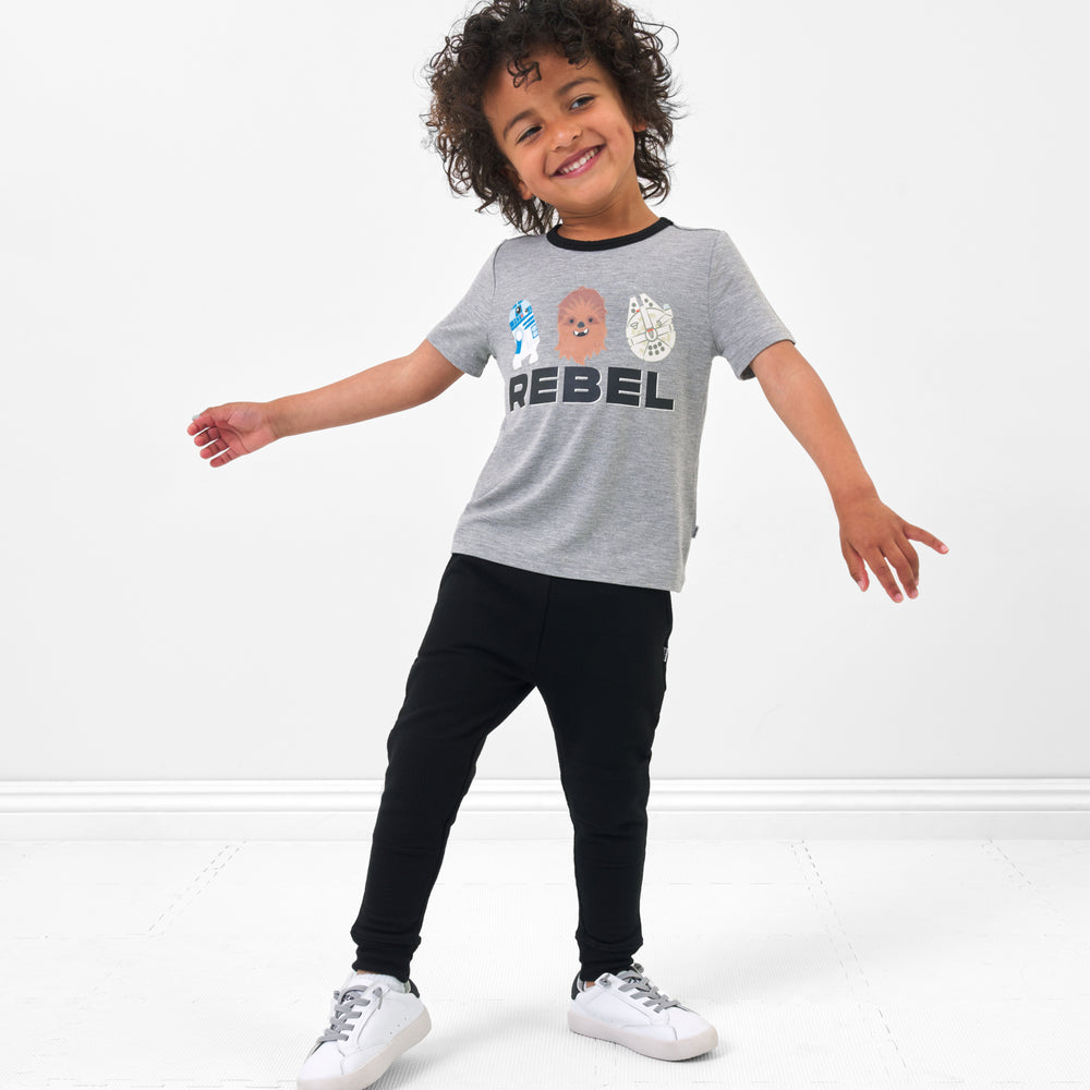 Alternate image of a child wearing a Rebel graphic tee and coordinating Play bottoms