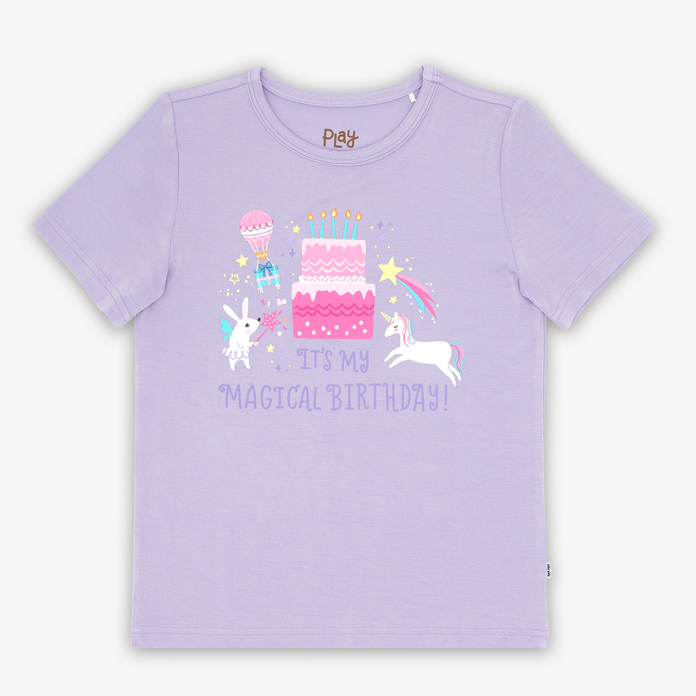 Flat lay image of the Magical Birthday Graphic Tee