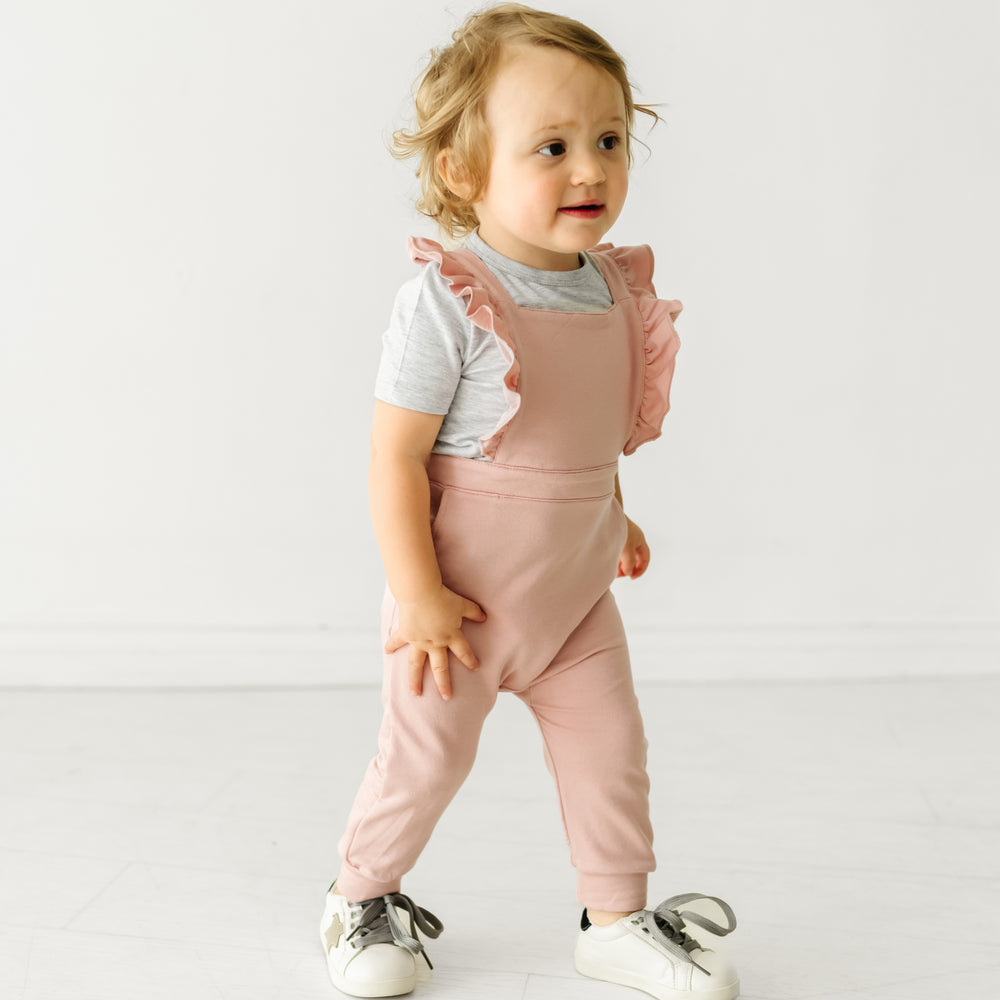 Alternate image of a child wearing a Mauve Blush ruffle overall and coordinating Play top