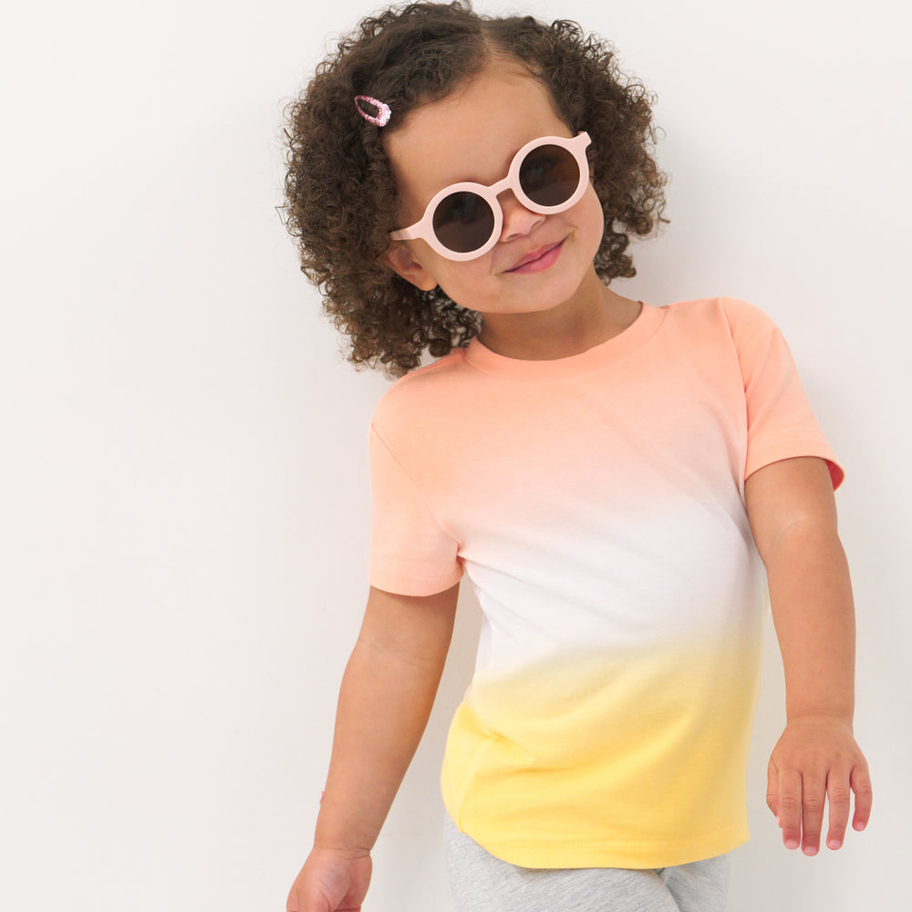 Alternate close up image of a child wearing a Sunny Ombre relaxed tee