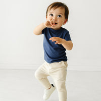 Alternate image of a child wearing a Vintage Navy classic tee and coordinating Play jogger