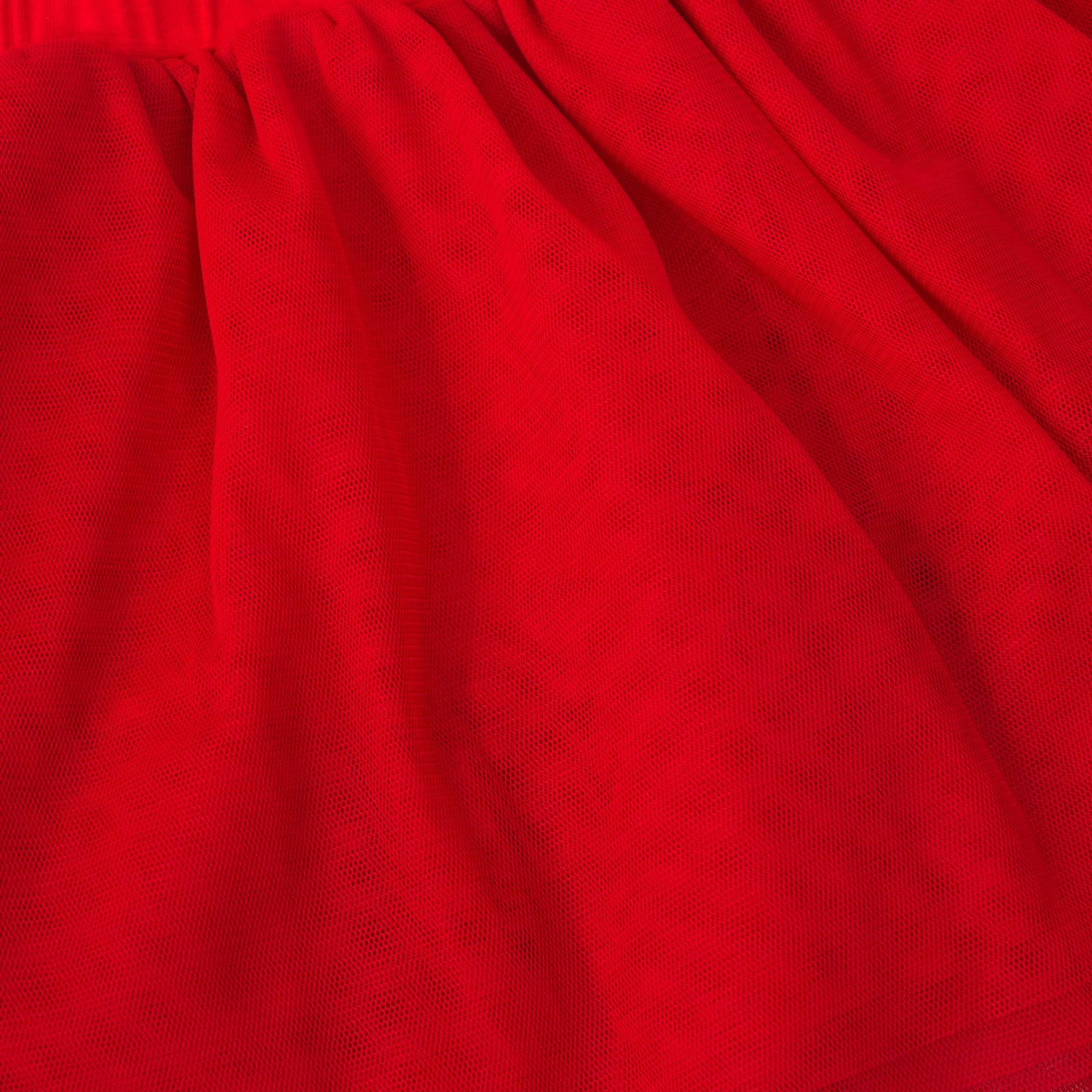 close up view of the red tulle in the candy red tutu skirt