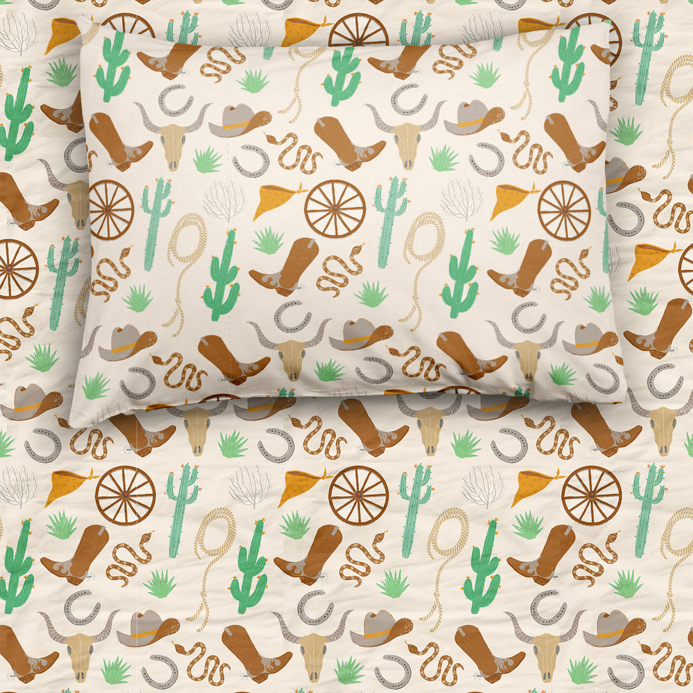 Flat lay image of Caramel Ready to Rodeo twin sheet set showing the matching pillowcase