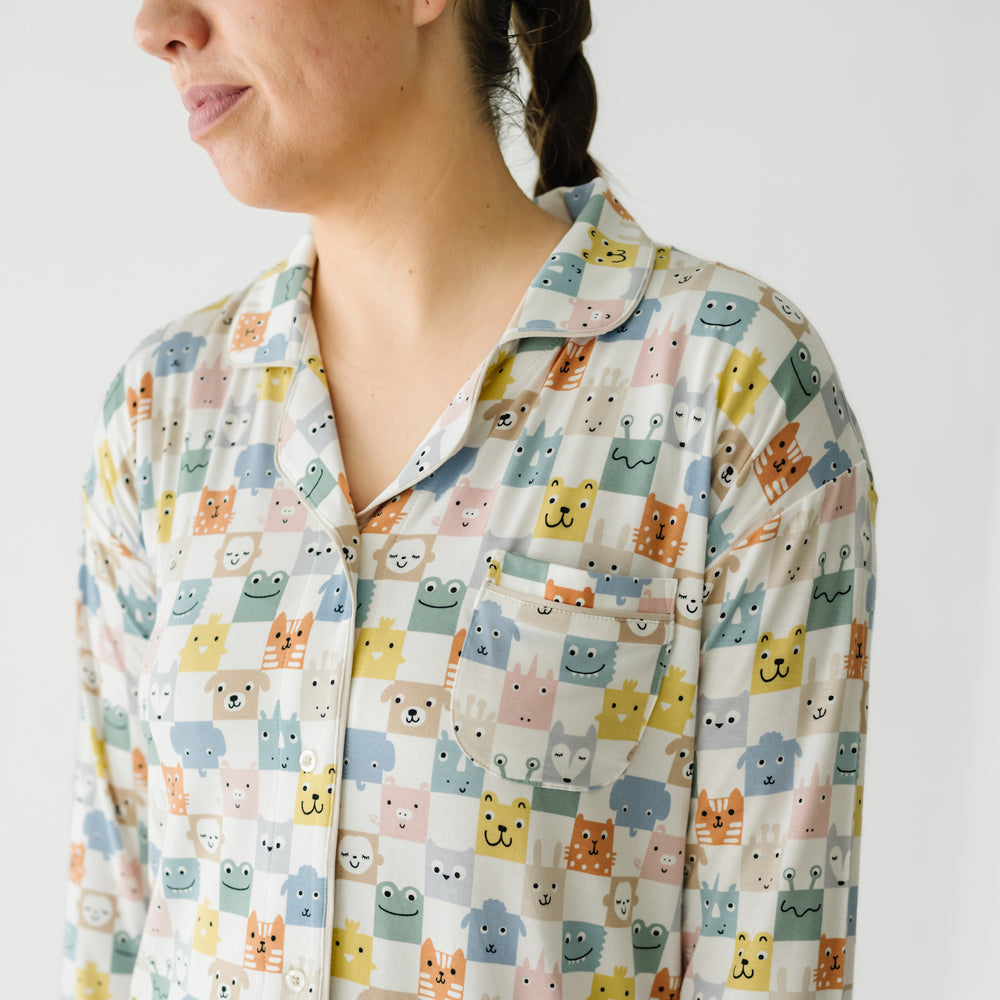 Close up image of a woman wearing a Check Mates women's sleep shirt