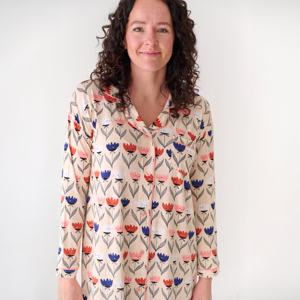 Close up image of a woman wearing a Flower Friends women's sleep shirt