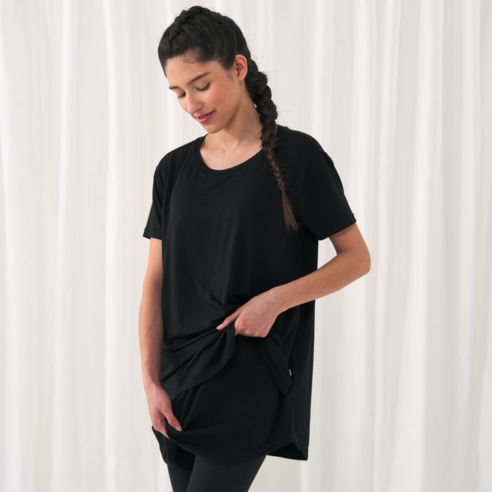woman posing wearing a Black women's nursing top
