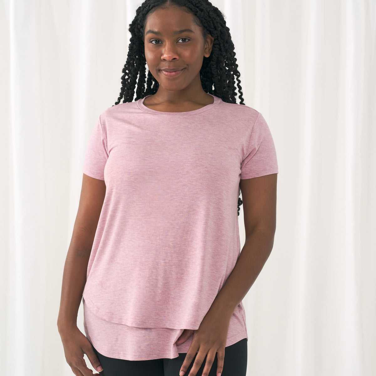 woman standing wearing a Heather Mauve women's nursing top