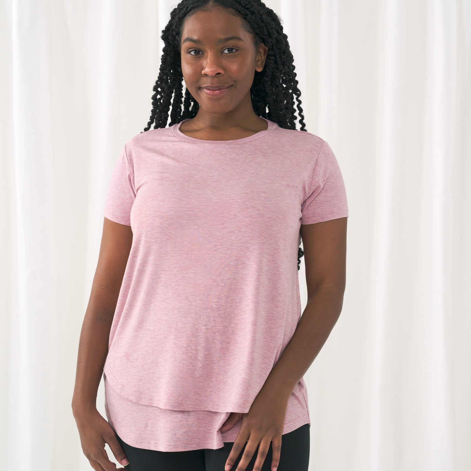 woman standing wearing a Heather Mauve women's nursing top