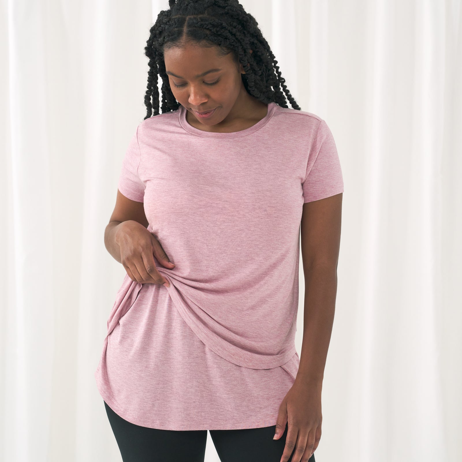 woman posing wearing a Heather Mauve women's nursing top