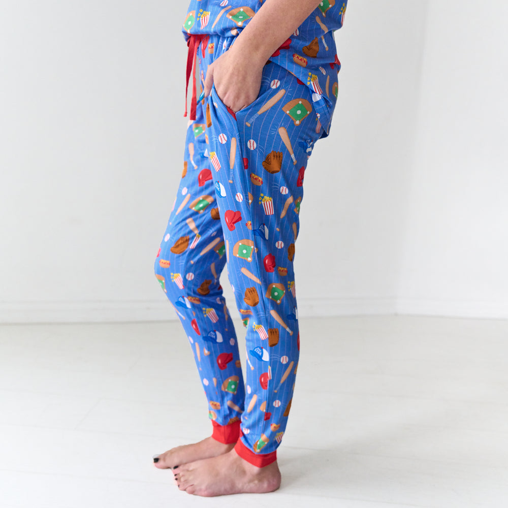 Close up profile image of a woman wearing Blue All Stars women's pajama pants