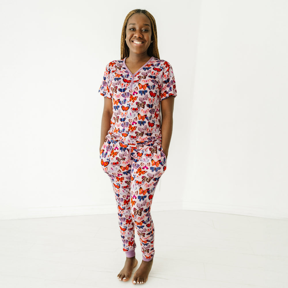 Woman wearing Butterfly Kisses women's pajama pants and matching pajama top