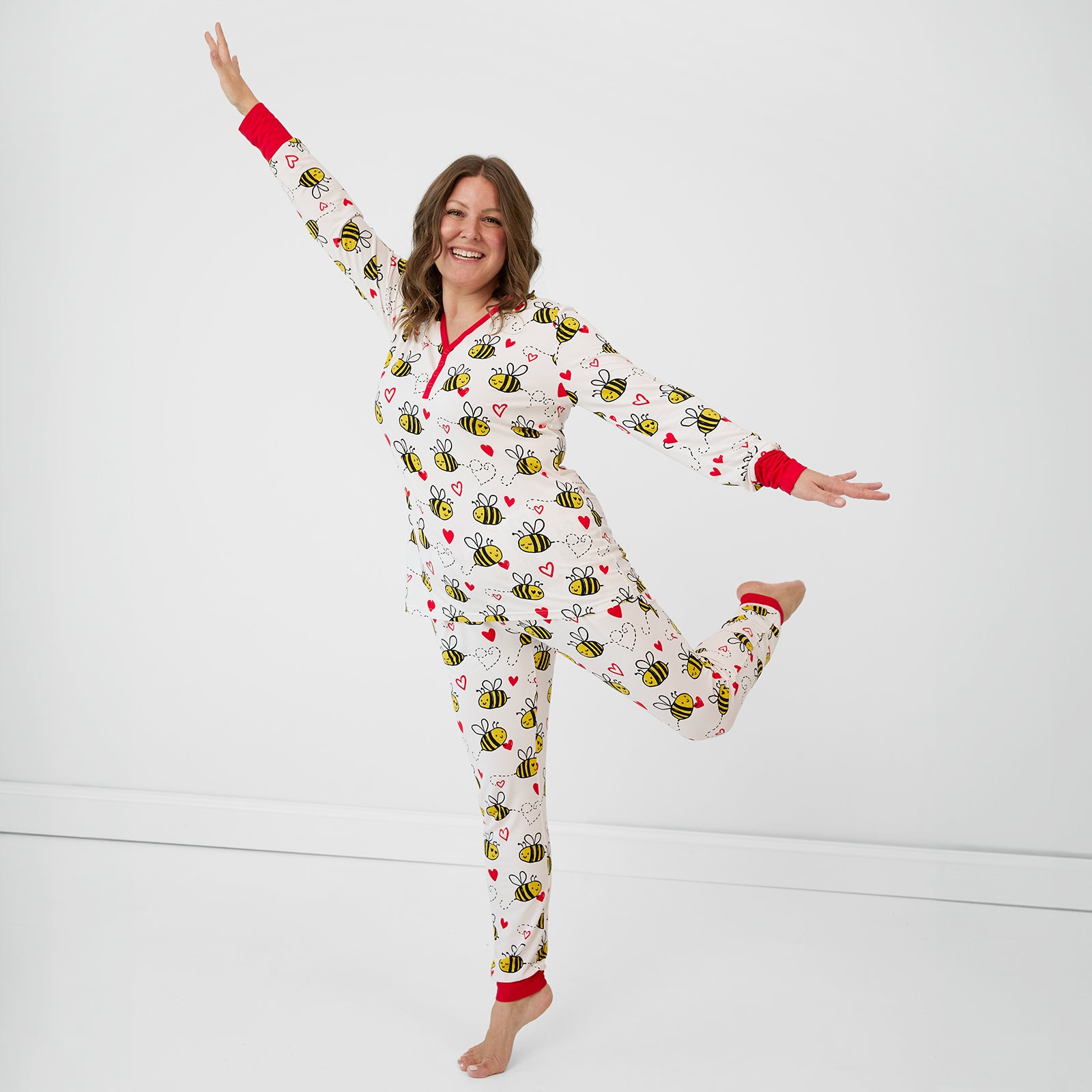 Image of a woman posing wearing Bee Mine women's pj top and matching pants