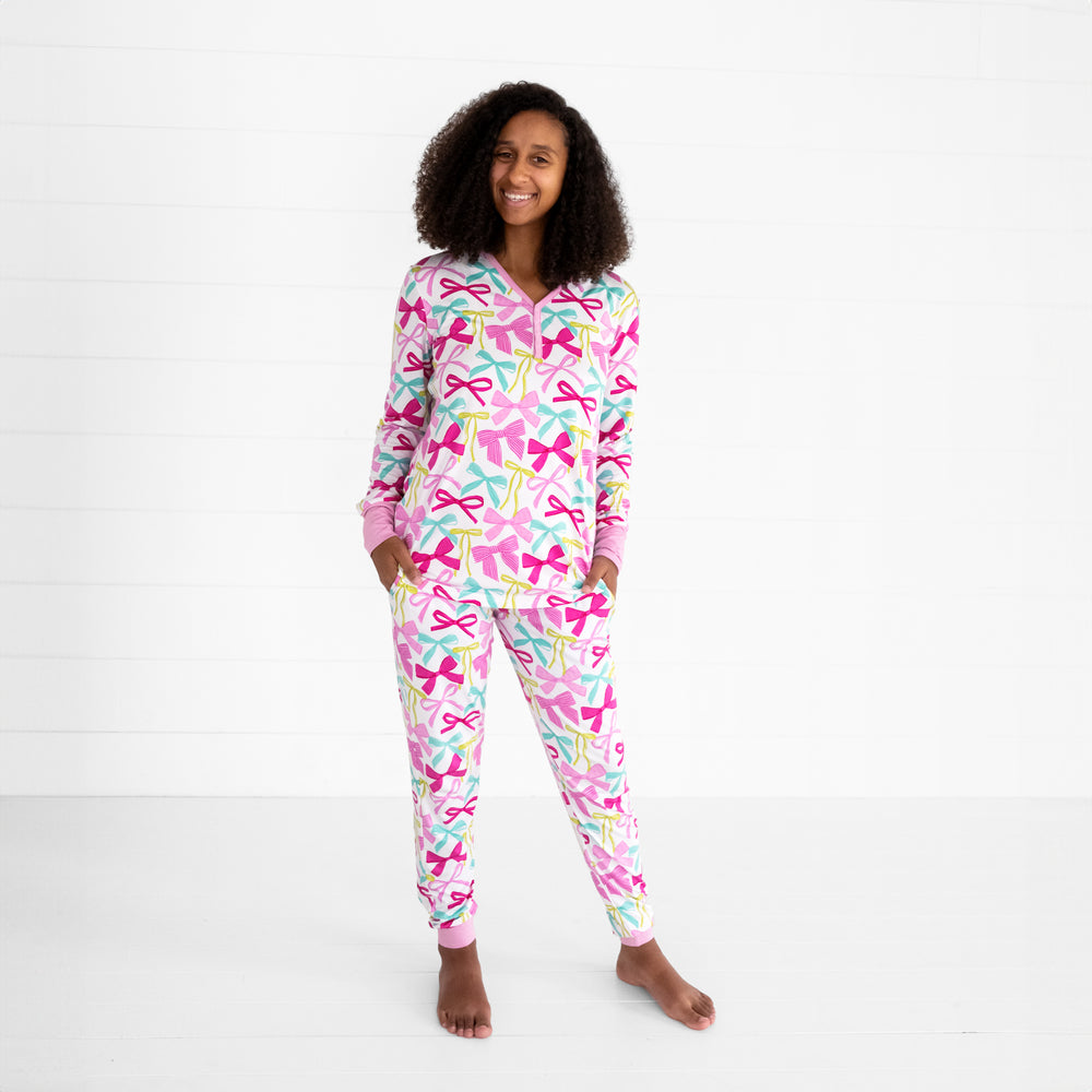 image of a woman wearing a Ribbons and Bows pj set in women's pj top and matching women's pj pants