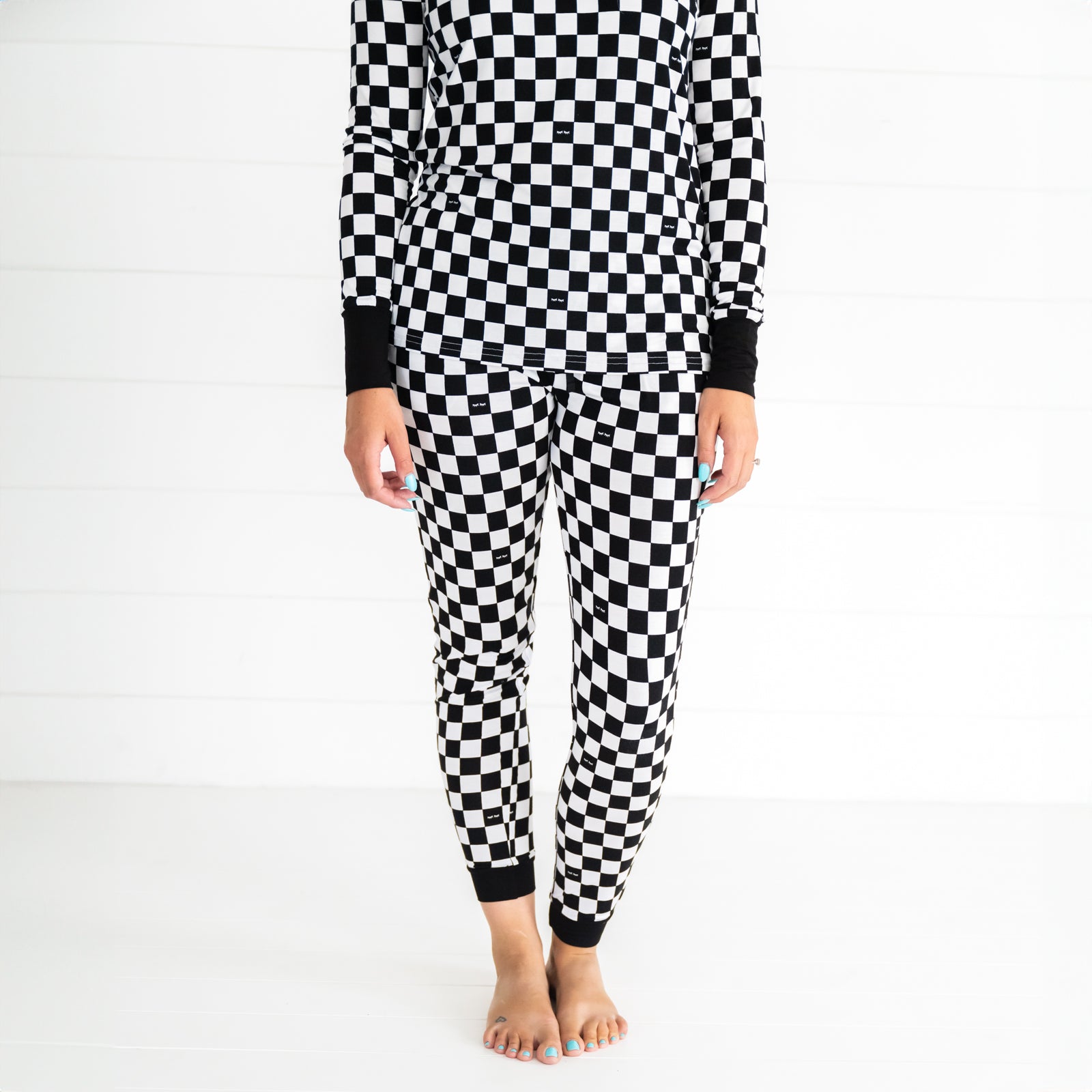 close up image of a woman wearing Cool Check women's pj pants