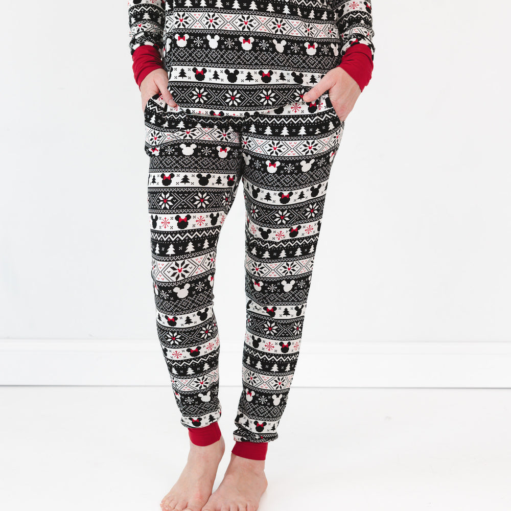 Close up image of a woman wearing Mickey Fair Isle women's pj pants