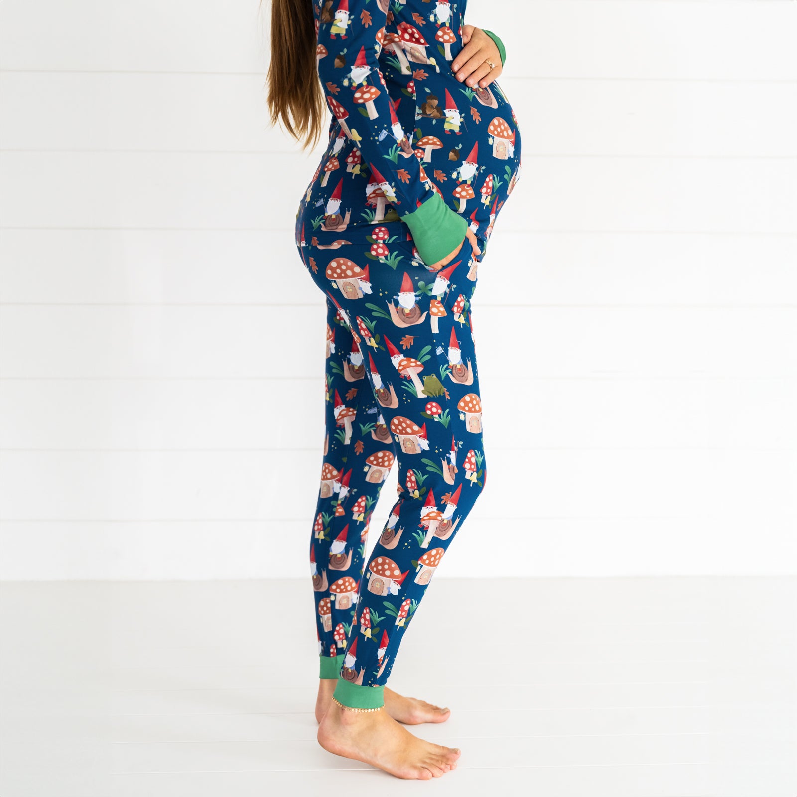 Side view image of the pregnant female model wearing the Forest Gnomes Women's Pajama Pant