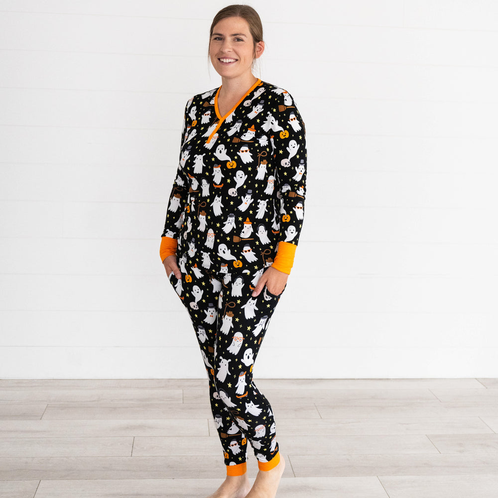 Female model wearing the Friendly Ghosts Women's Pajama Pants & Top