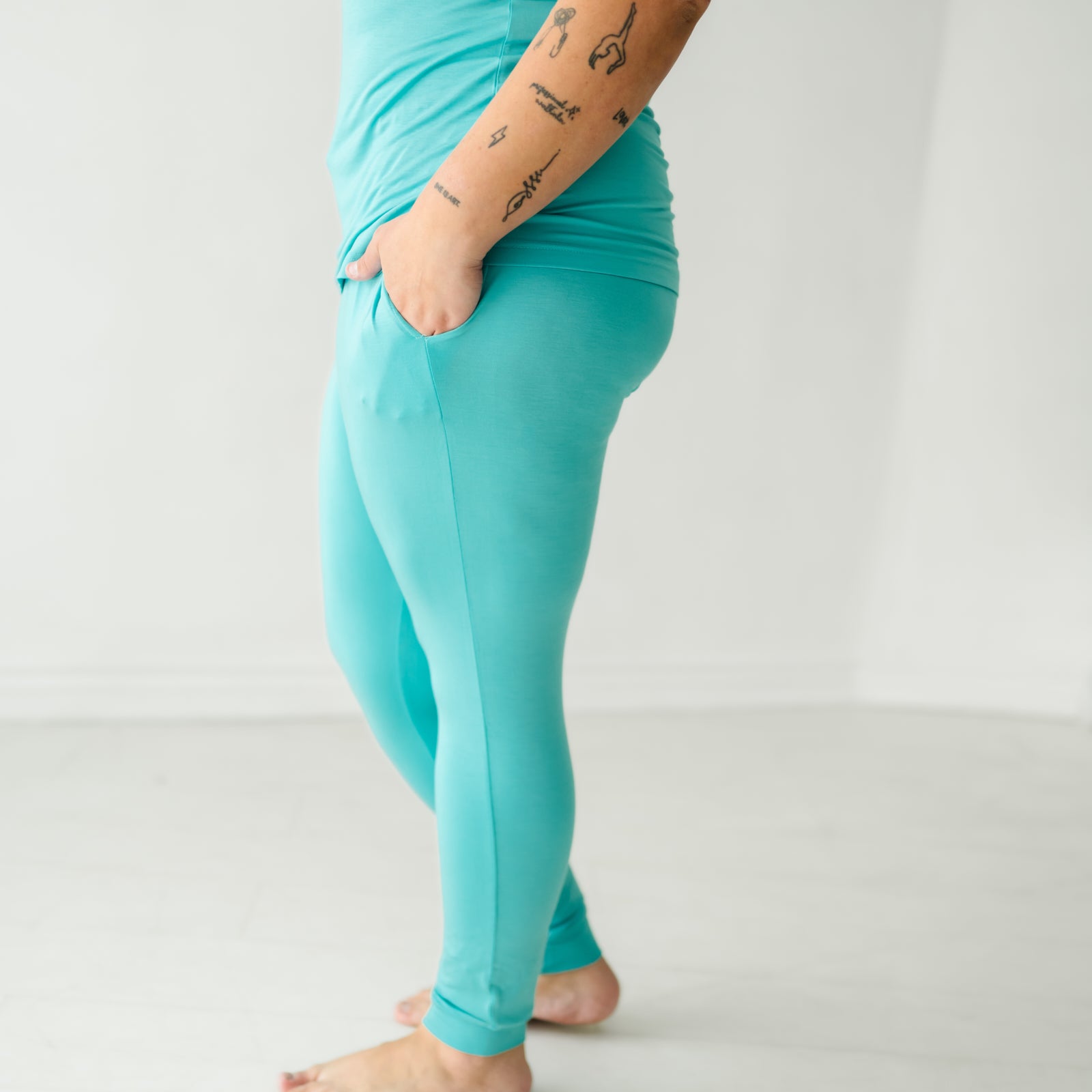 Profile image of a woman wearing Glacier Turquoise women's pajama pants