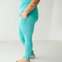 Profile image of a woman wearing Glacier Turquoise women's pajama pants