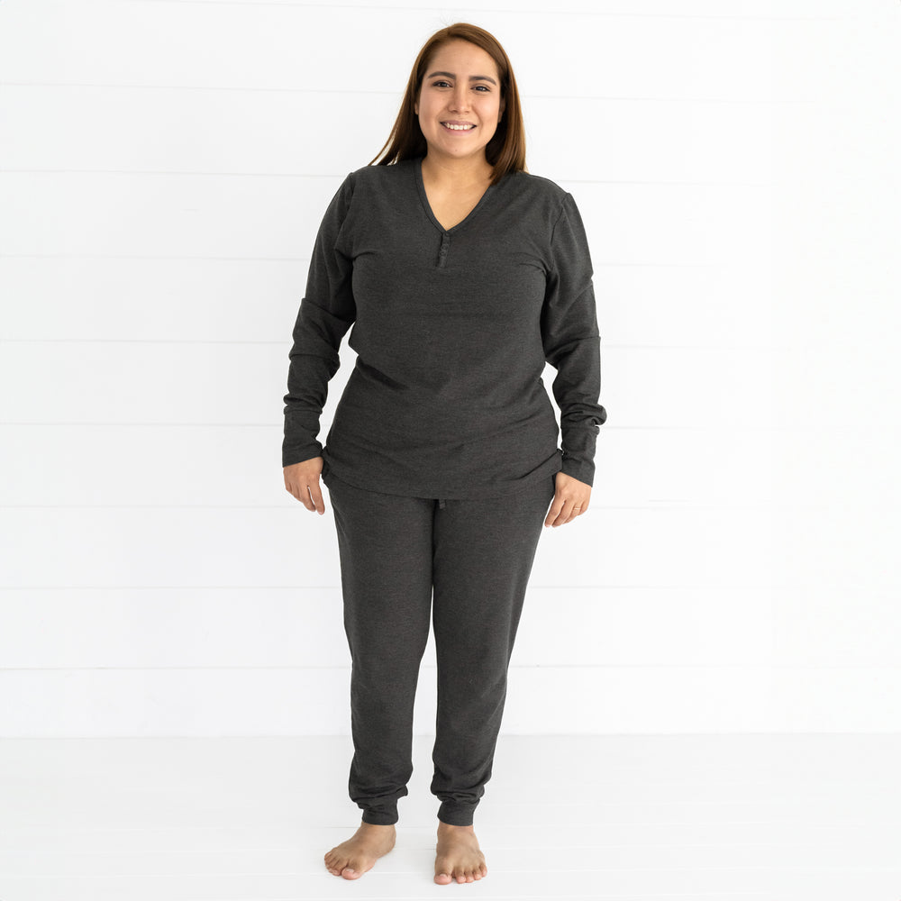 woman wearing women's cozy heather black pj top and matching pants