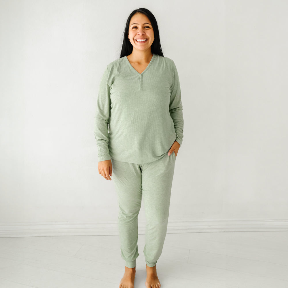 Woman wearing women's Heather Sage pajama top and matching women's pajama pants