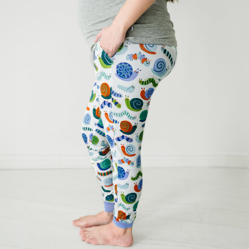 Close up side view image of a woman wearing Inchin' Along women's pajama pants