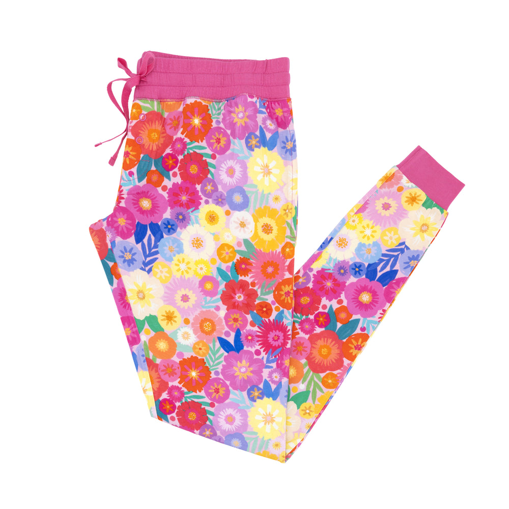 Flat lay image of Rainbow Blooms women's pajama pants