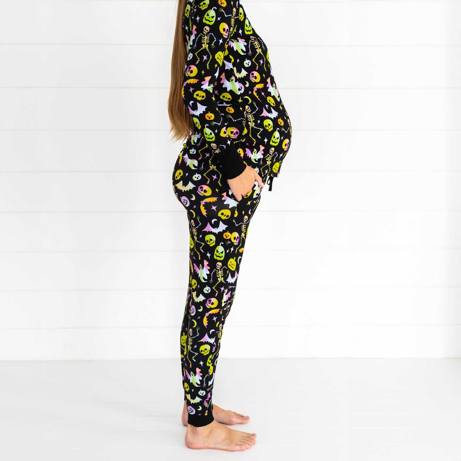 profile view of a woman wearing Cool Ghouls women's pj top and women's pj pants