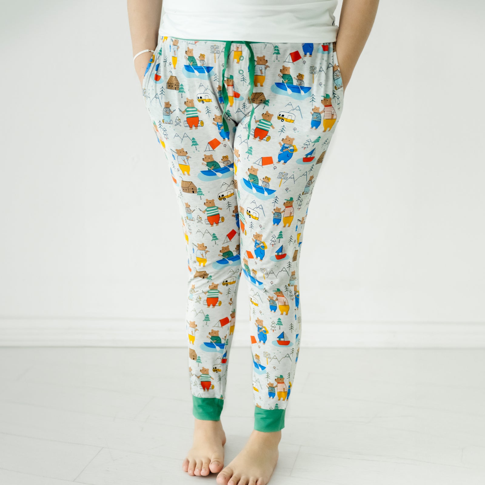 Close up image of a woman wearing Papa Bear women's pj pants