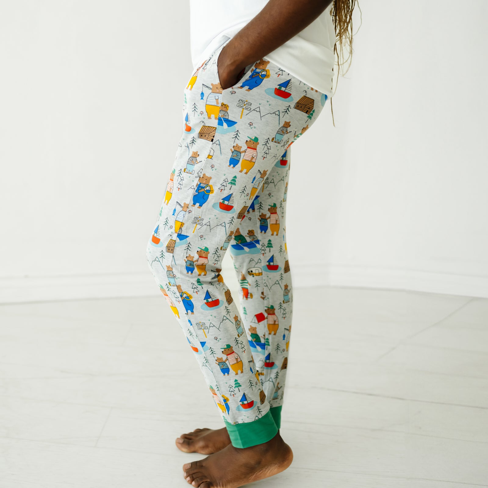 Close up profile image of a woman wearing Papa Bear women's pj pants