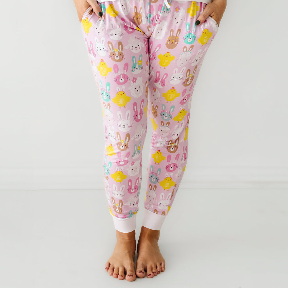 Click to see full screen - Close up image of a woman wearing Pink Pastel women's pajama pants