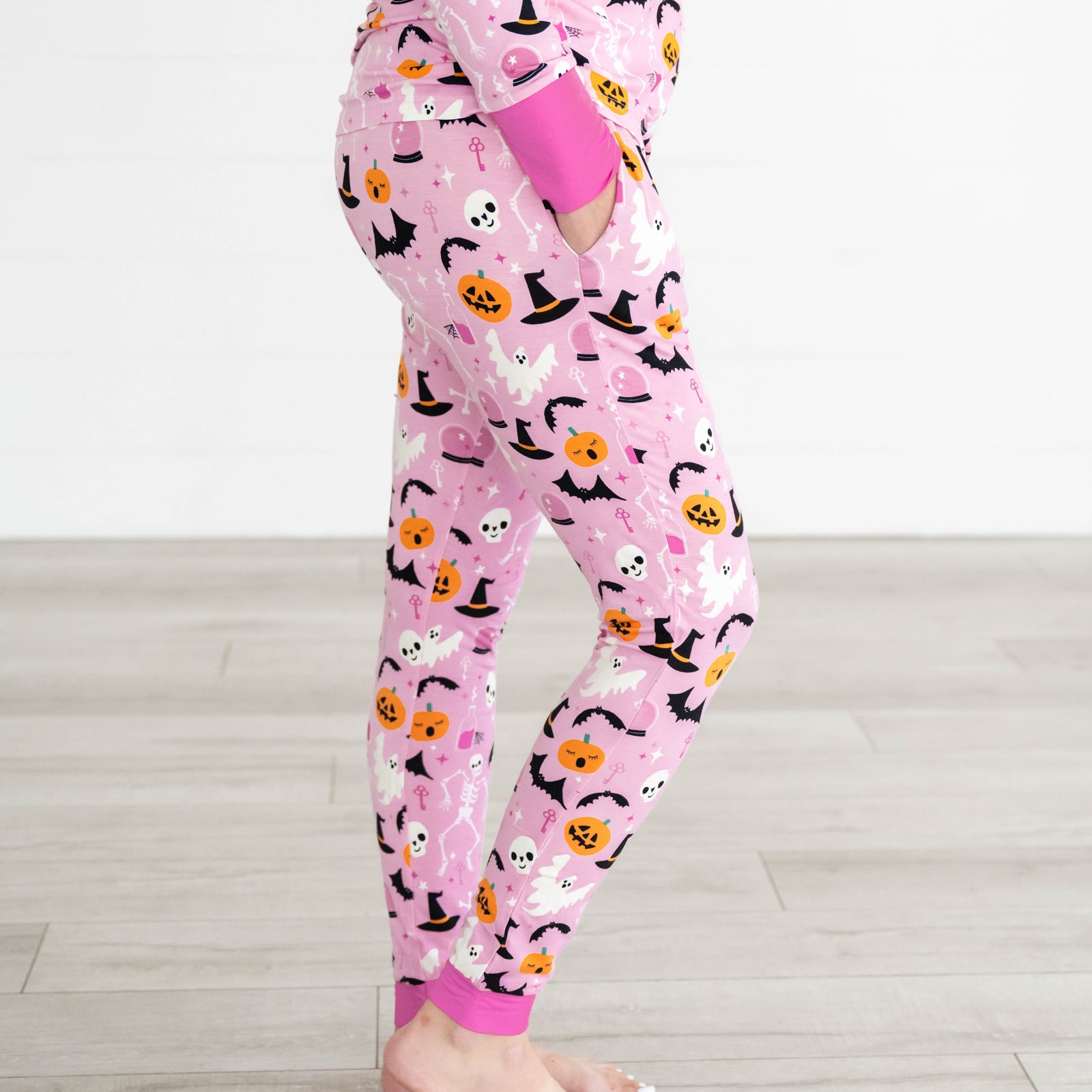 Side view image of the Pink Glowing Ghouls Women's Pajama Pants